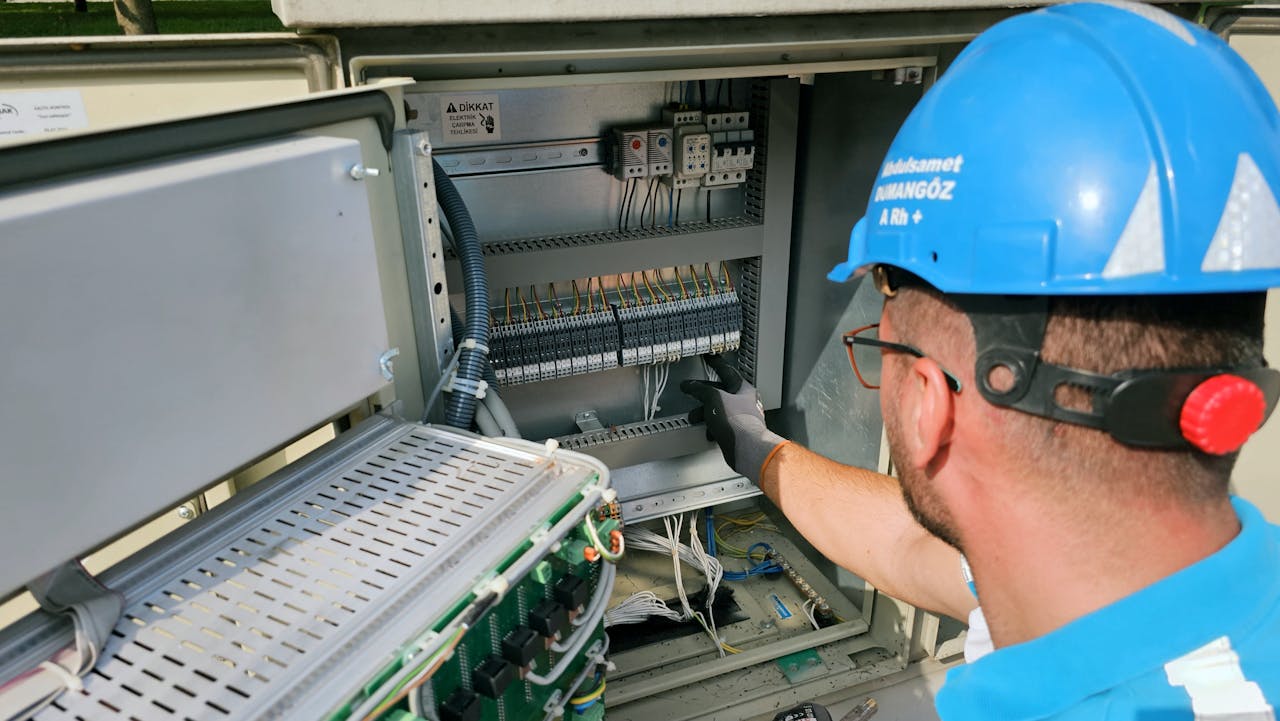 Emergency electrician repairing power outage in Cape Town home at night